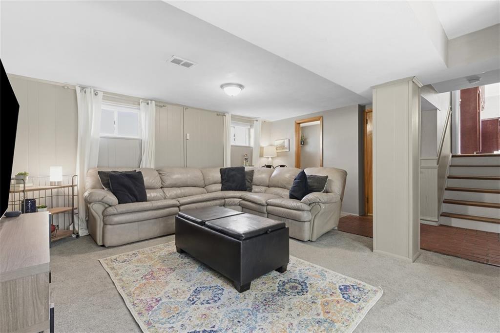 301 Amity Road Glenshaw, PA 15116 - Photo 15 of 30 a living room with furniture and a flat screen tv