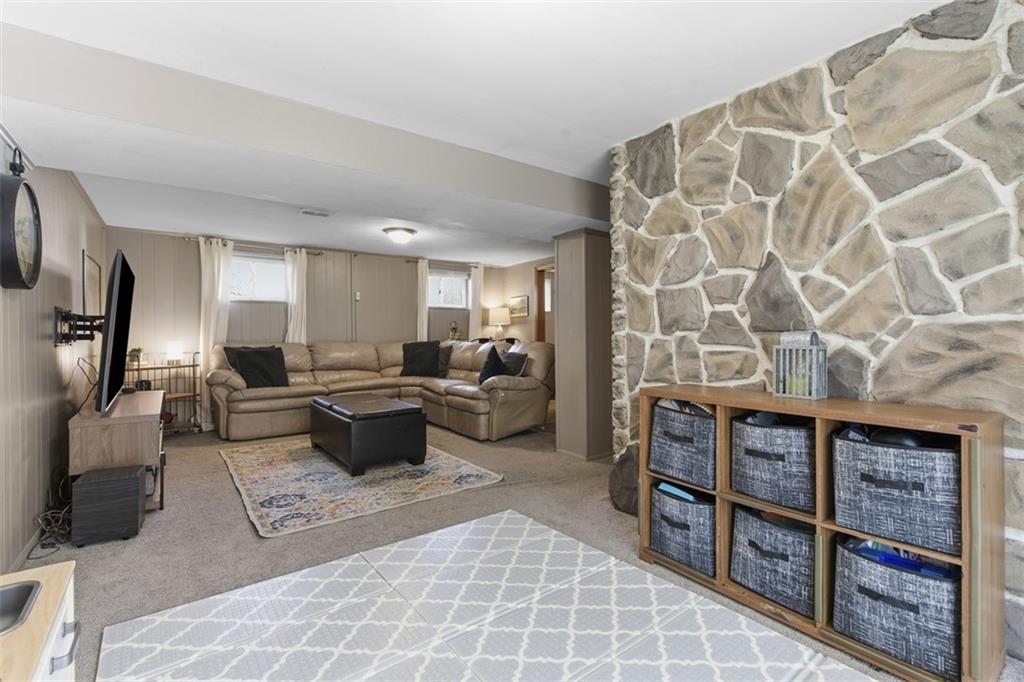 301 Amity Road Glenshaw, PA 15116 - Photo 18 of 30 a living room with furniture a wooden floor and next to a window