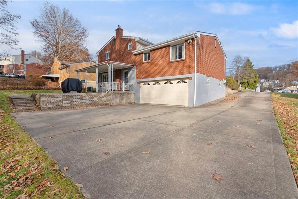 301 Amity Road Glenshaw, PA 15116 - Photo 26 of 30 a view of a house with a yard