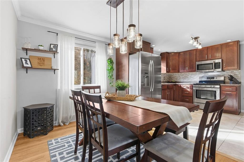 301 Amity Road Glenshaw, PA 15116 - Photo 5 of 30 a view of a dining room with furniture window and outside view