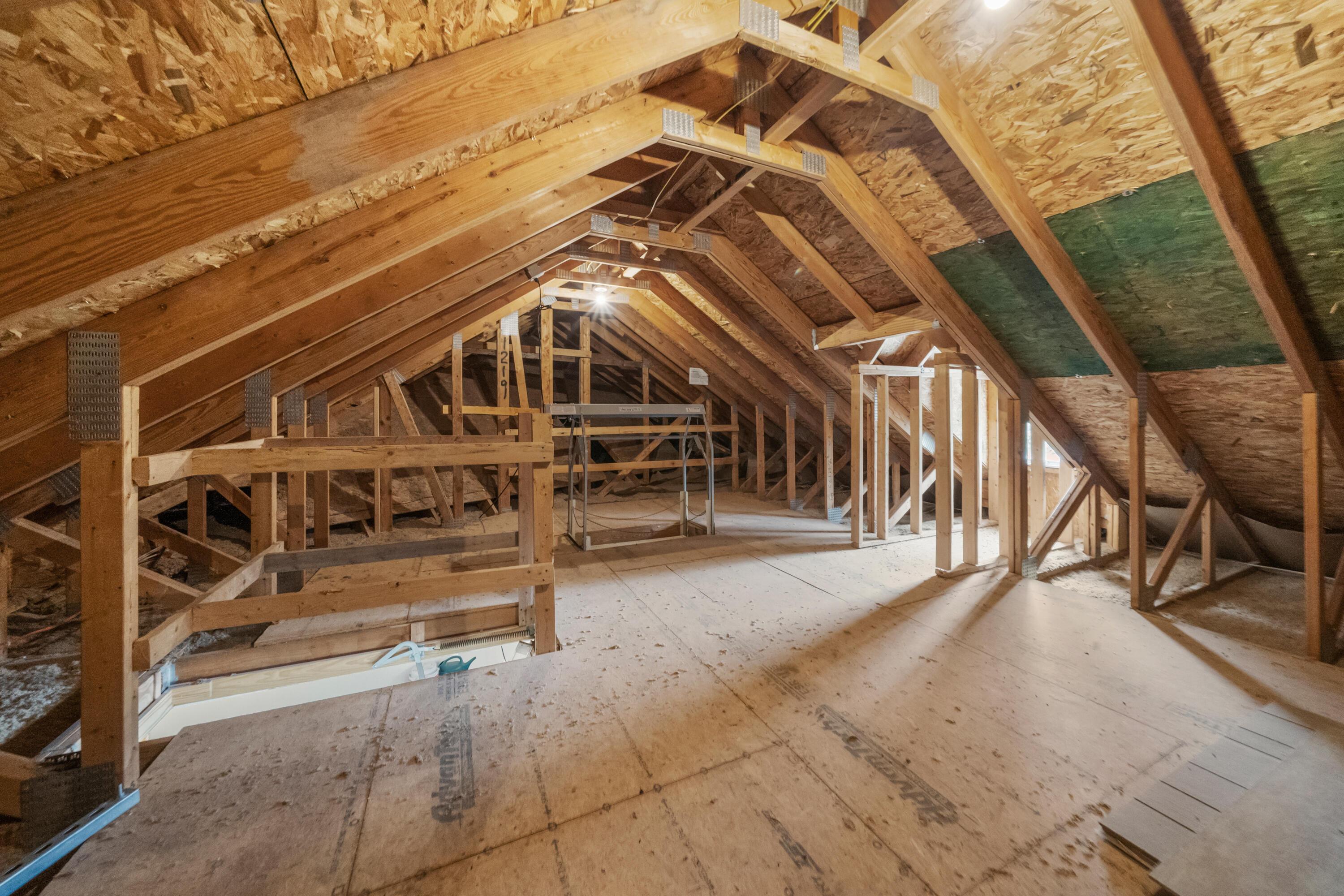 4640 Maynard Road Delaware, OH 43015 - Photo 57 of 91 Expansive unfinished attic space featuring exposed wood framing, wood-finish flooring, and sloped ceilings