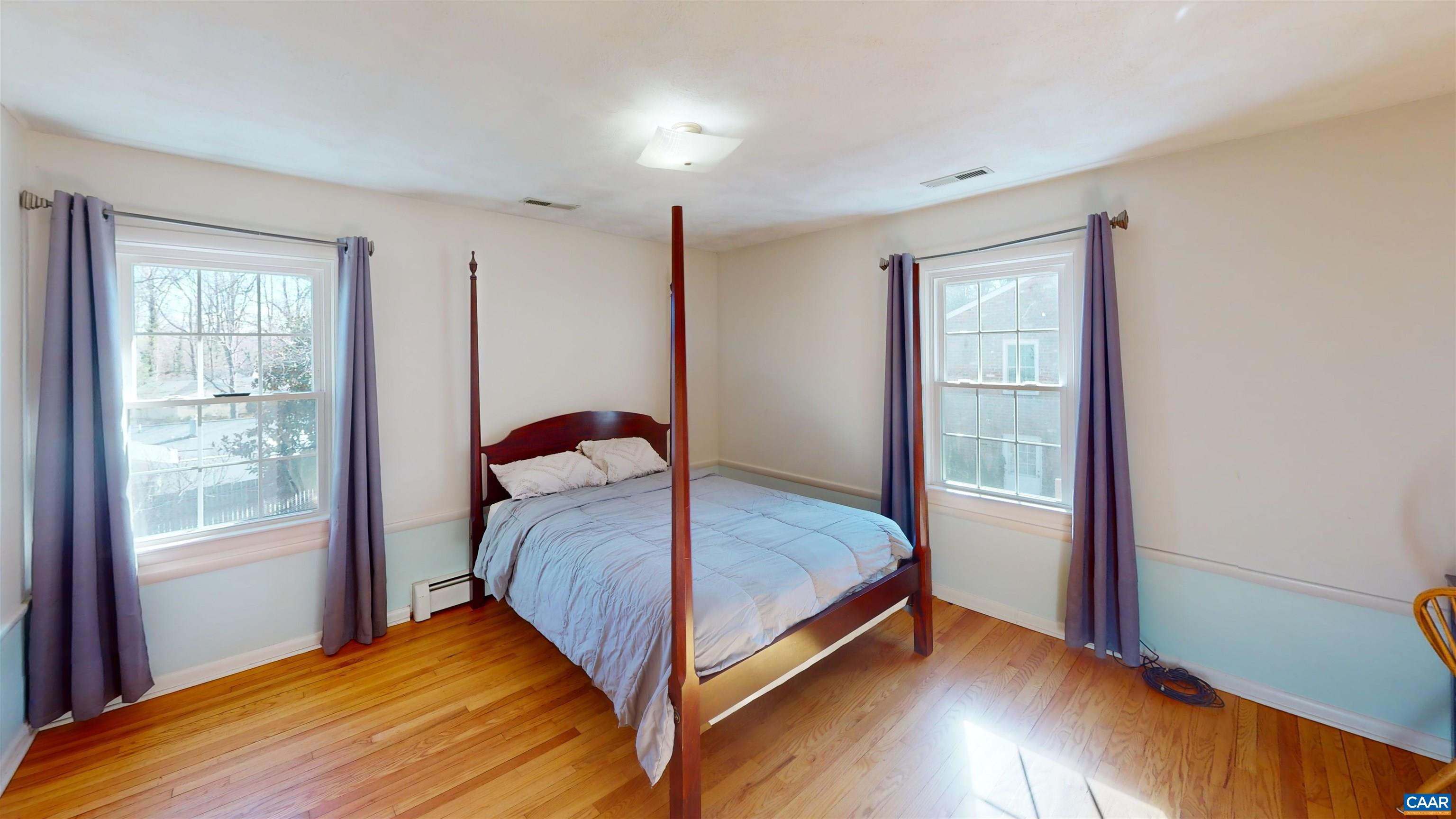 206 Georgetown Road Charlottesville, VA 22901 - Photo 12 of 35 a bedroom with a bed and window