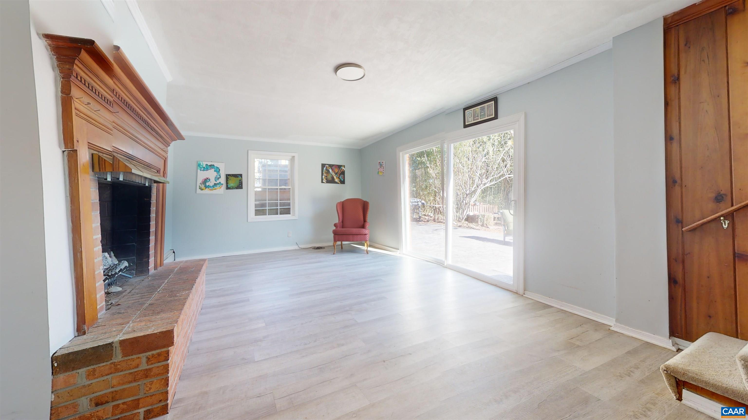 206 Georgetown Road Charlottesville, VA 22901 - Photo 20 of 35 a view of empty room with wooden floor and fan