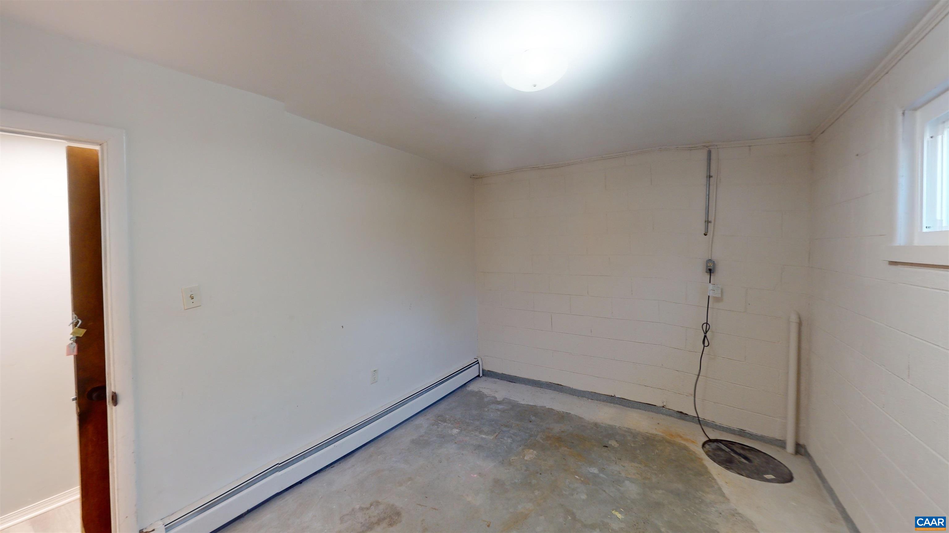 206 Georgetown Road Charlottesville, VA 22901 - Photo 28 of 35 an empty room with a empty space and window