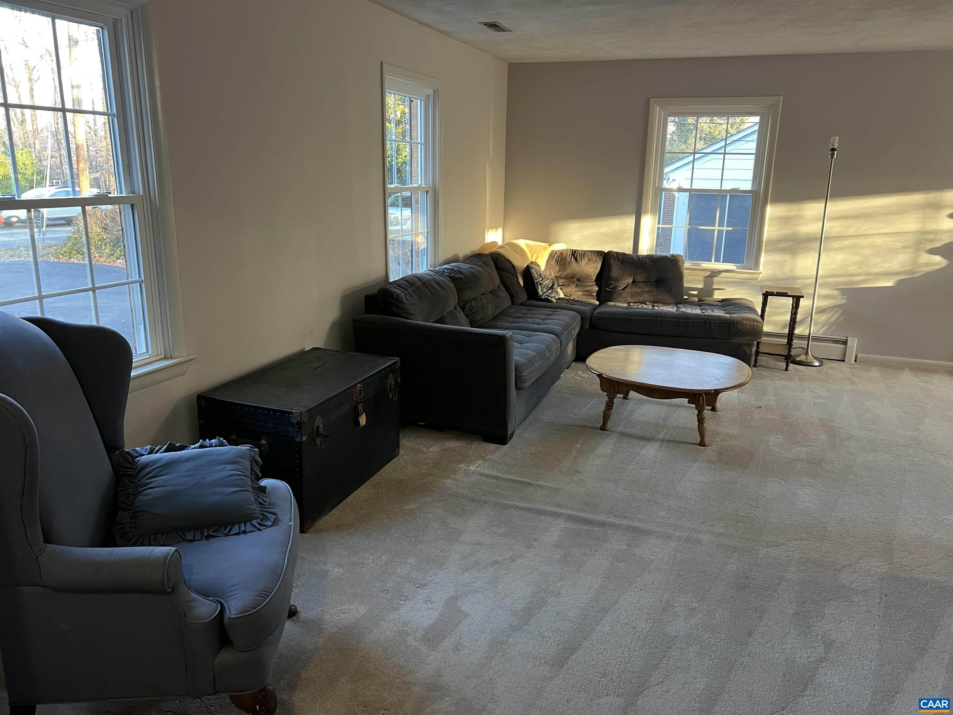 206 Georgetown Road Charlottesville, VA 22901 - Photo 8 of 35 a living room with furniture and a window