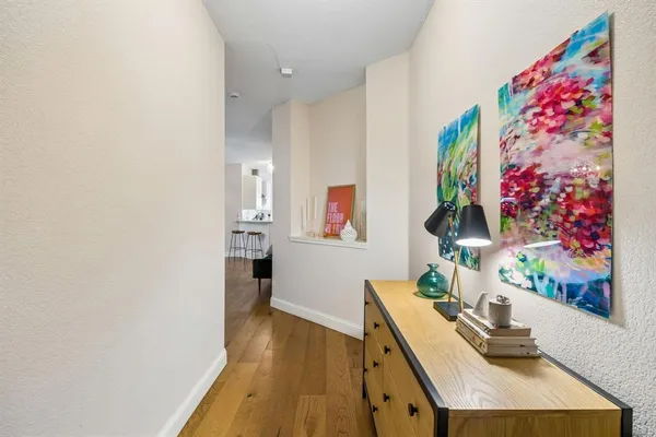 a room with furniture and wooden floor