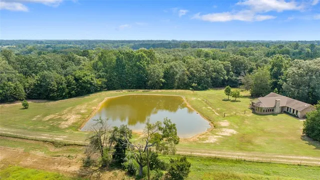 a view of a swimming pool with an ocean view