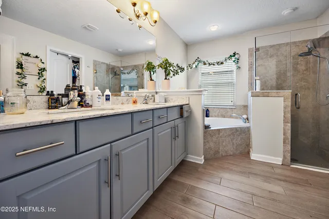 a kitchen with a sink and refrigerator