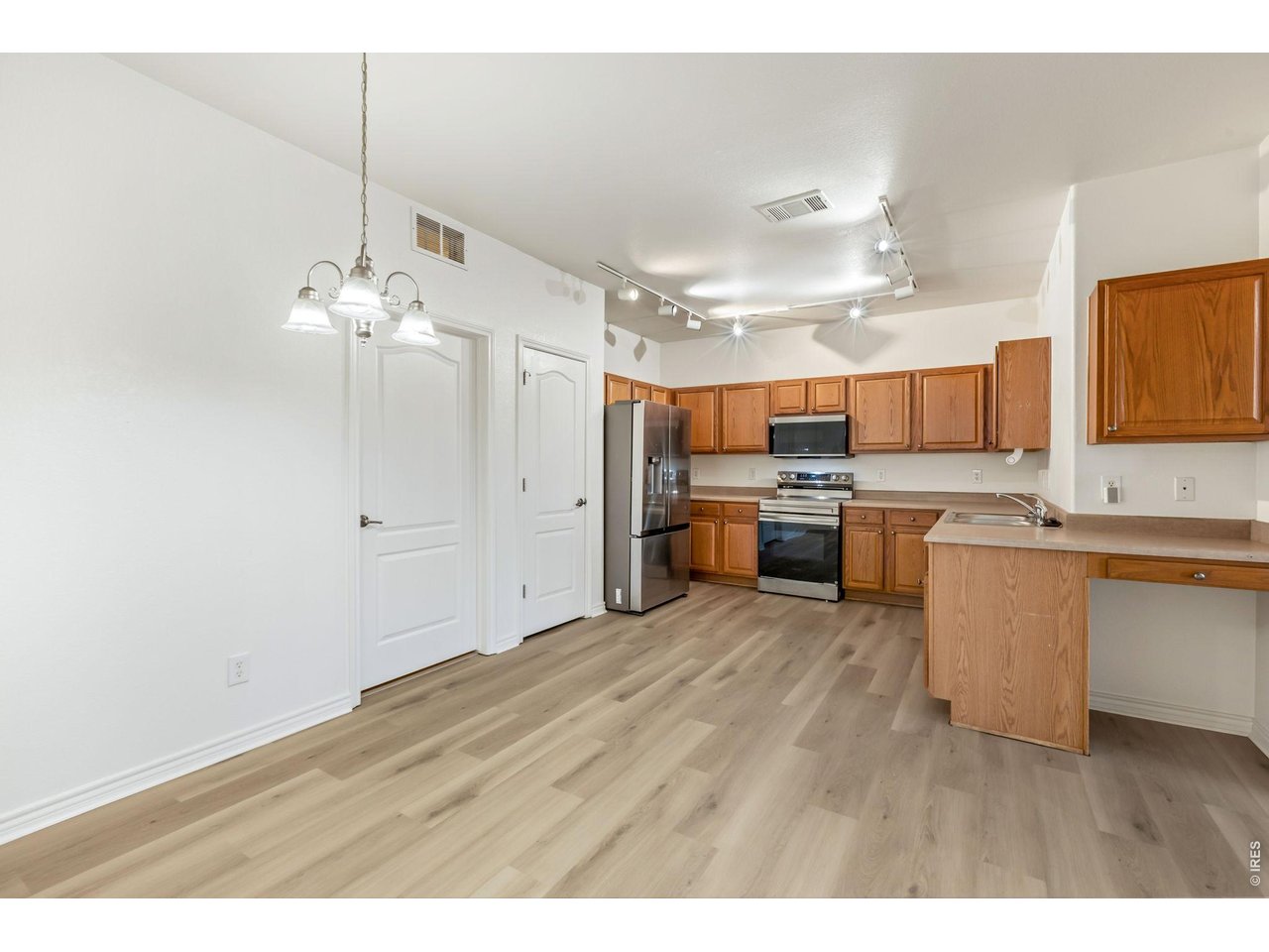 4672 West 20th Road, Unit 2323 Greeley, CO 80634 - Photo 15 of 34 Large pantry for extra storage