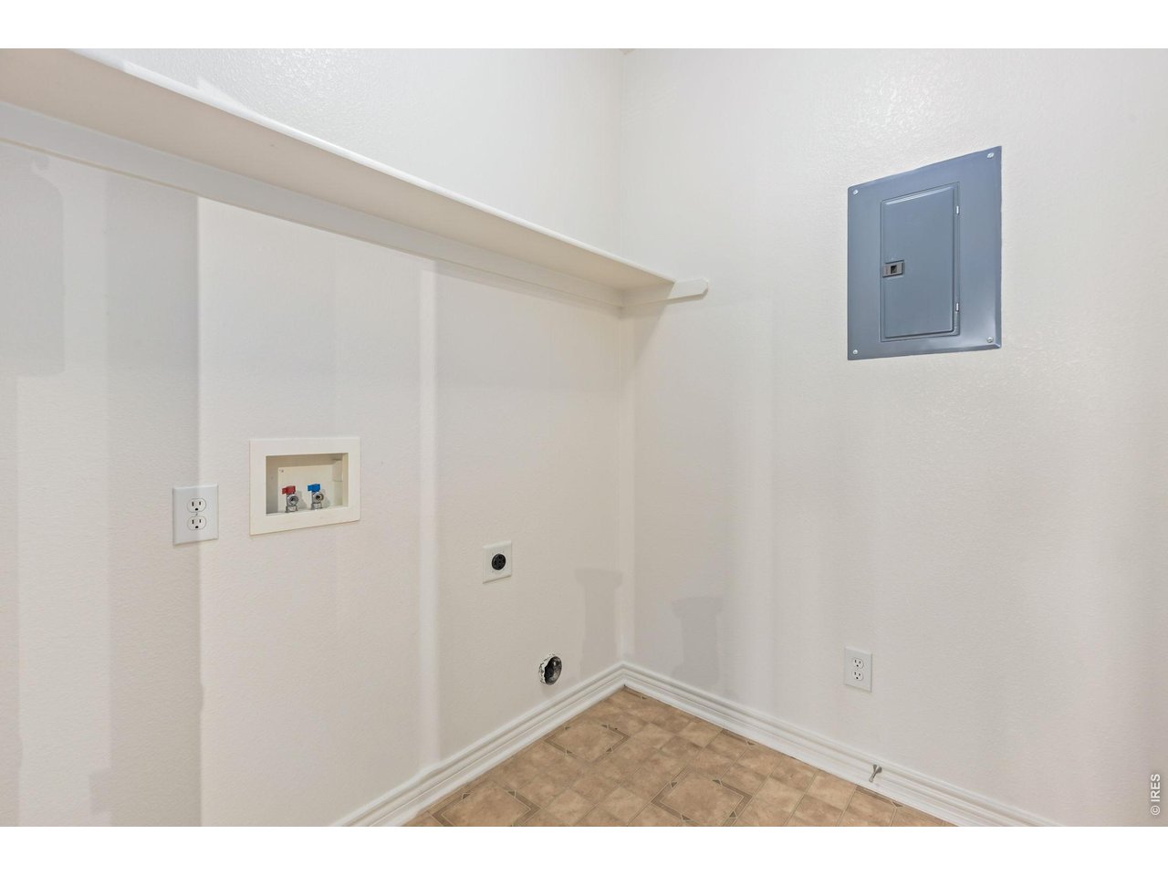 4672 West 20th Road, Unit 2323 Greeley, CO 80634 - Photo 28 of 34 Laundry room off of the kitchen/dining area