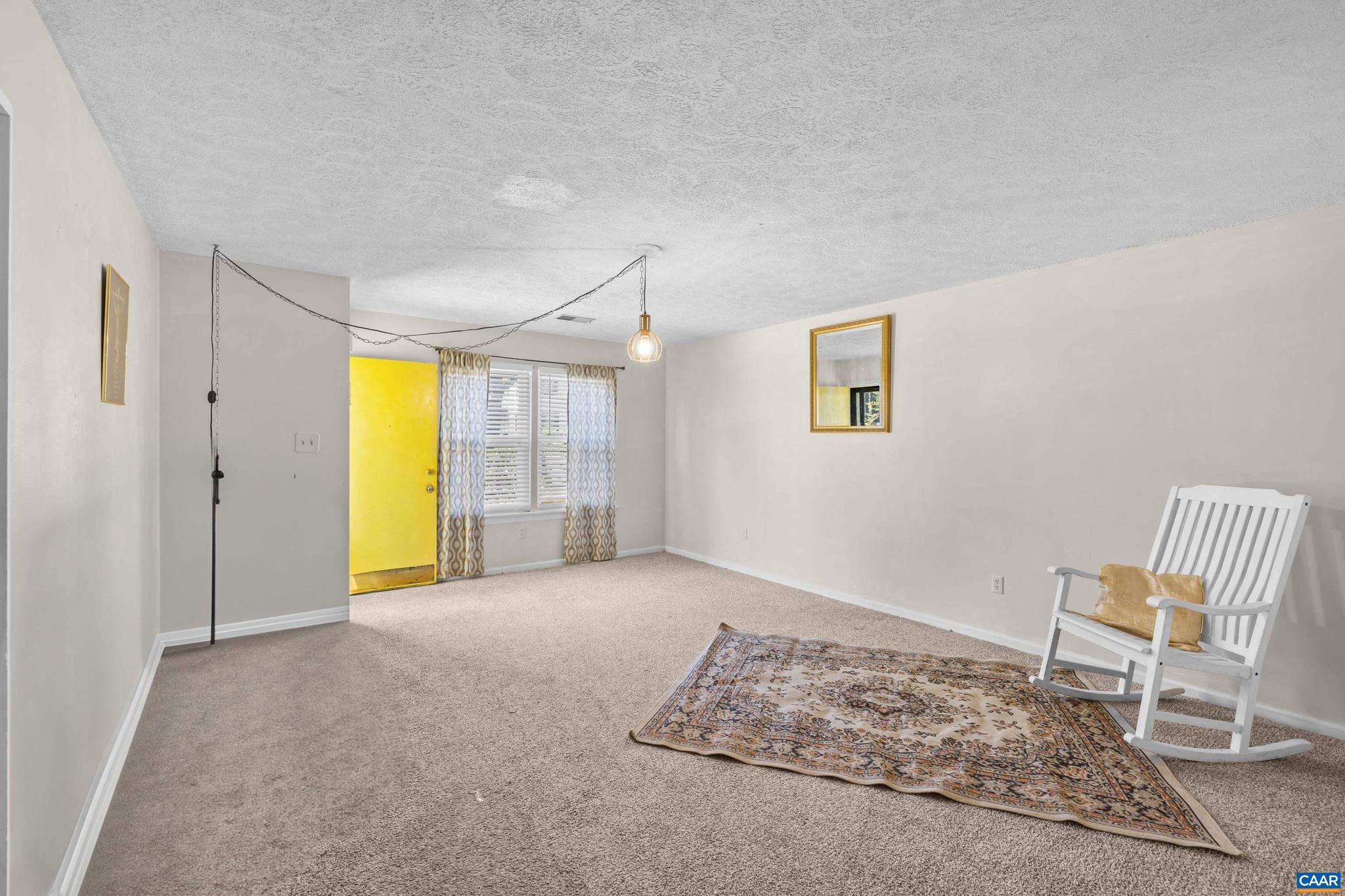 215 Dice Street Charlottesville, VA 22902 - Photo 11 of 52 a view of an empty room with a window
