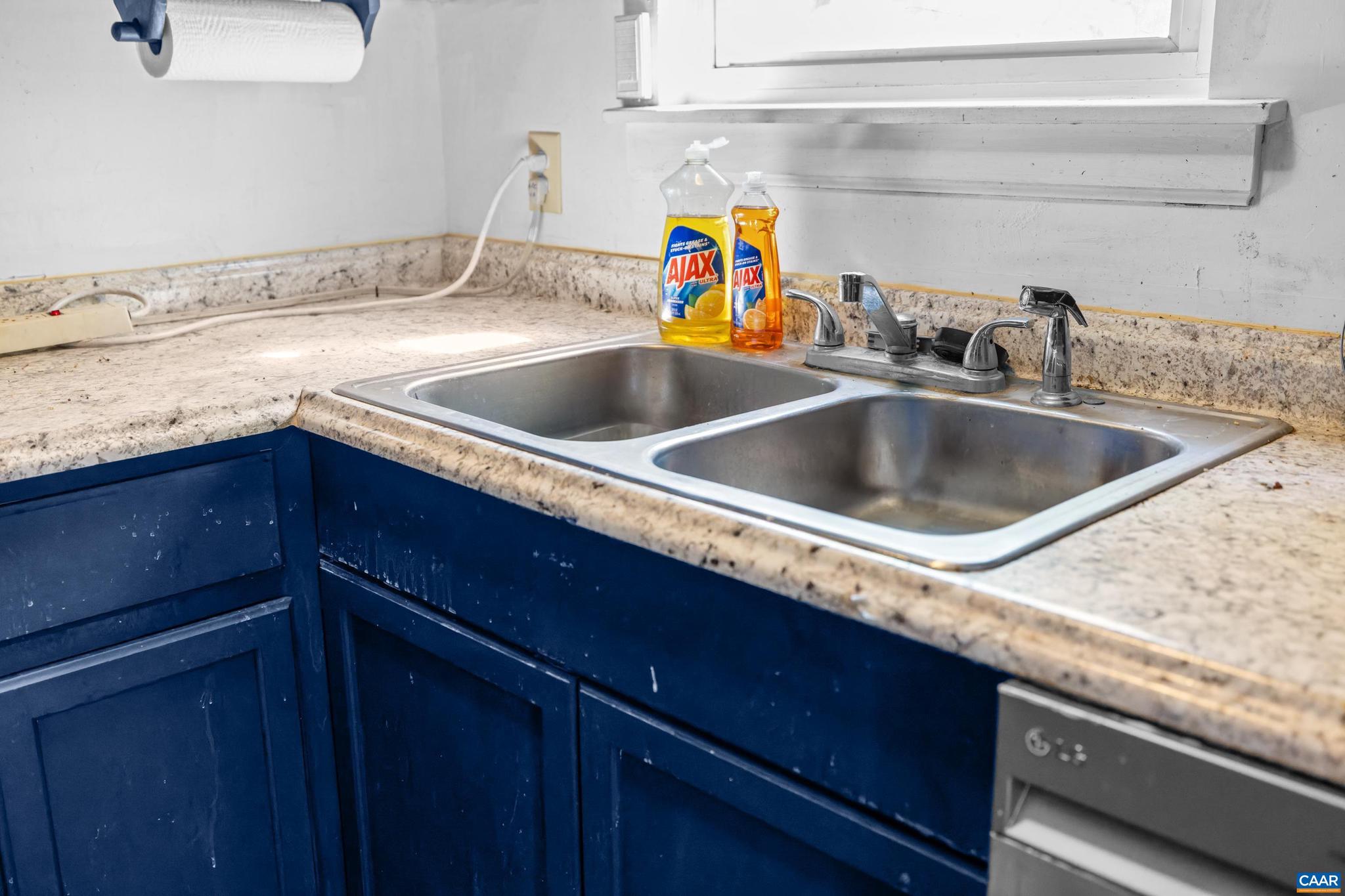 215 Dice Street Charlottesville, VA 22902 - Photo 18 of 52 a kitchen with a sink and a granite top