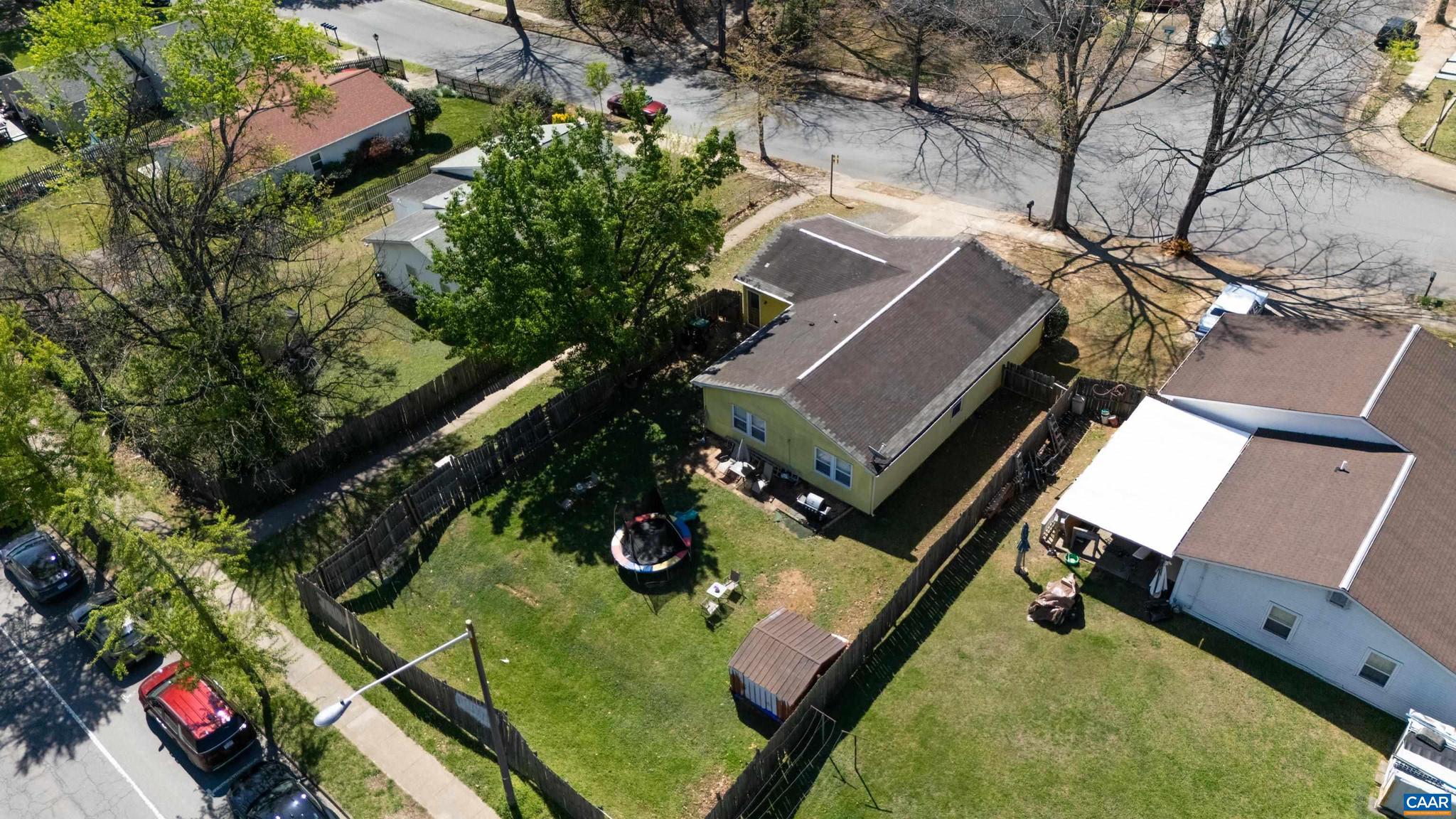 215 Dice Street Charlottesville, VA 22902 - Photo 43 of 52 an aerial view of a house roof deck with couches and wooden floor