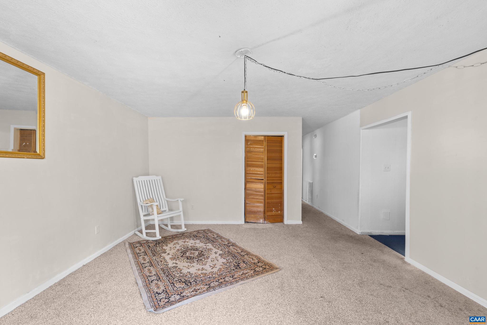 215 Dice Street Charlottesville, VA 22902 - Photo 9 of 52 a view of room with furniture and wooden floor