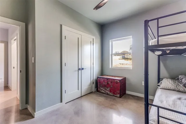 a room with a bed and a window