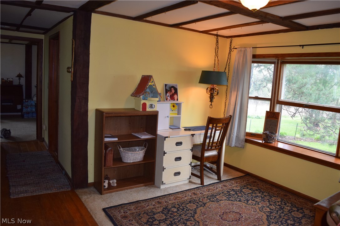 14330 Georgia Road Middlefield, OH 44062 - Photo 8 of 32 Natural beams show throughout the homes walls & ceilings.
