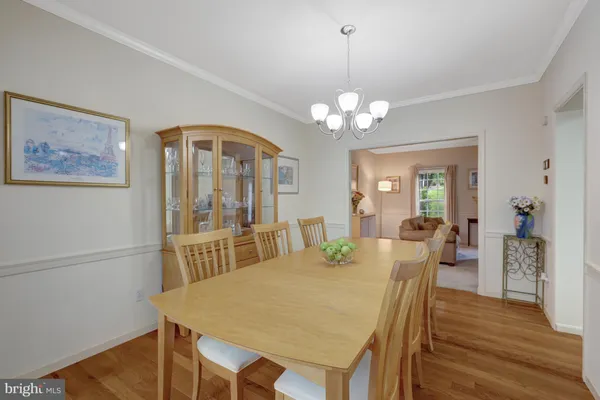 a kitchen with white cabinets and a sink