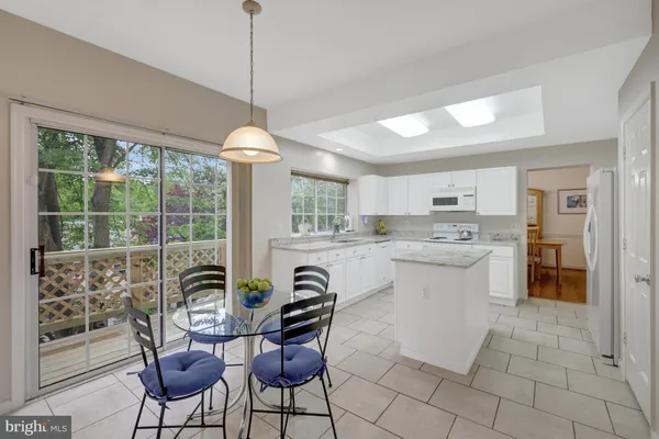 a view of a workspace with furniture