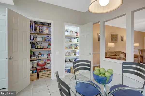 a bathroom with a sink a mirror and vanity