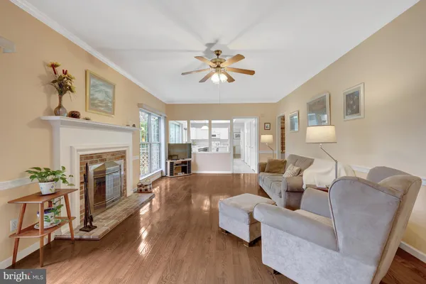 a spacious bedroom with a large bed and a large window