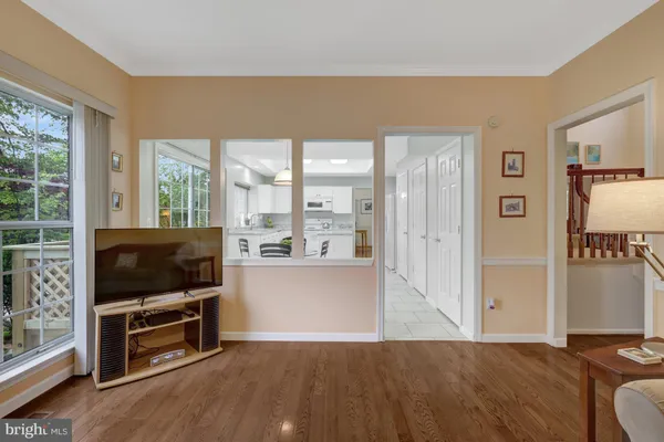 a bed room with a bed window and a night stand