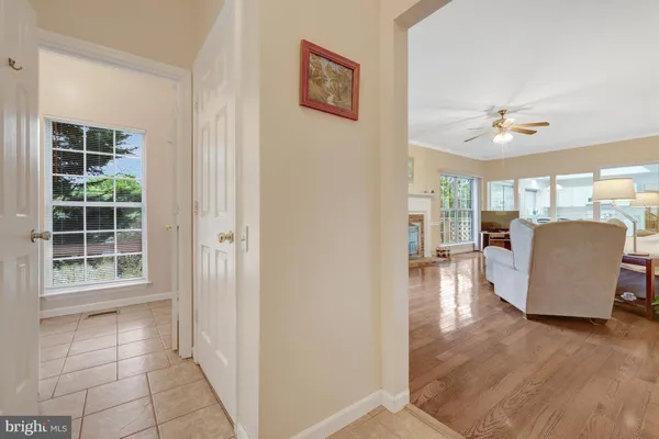 a bathroom with a double vanity sink a toilet and a mirror