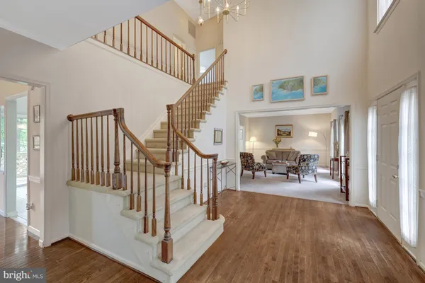 a view of a livingroom with furniture and a window