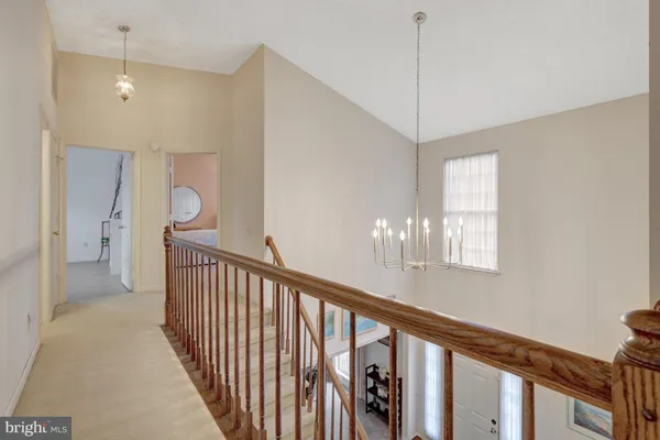 a view of a house with pool on deck