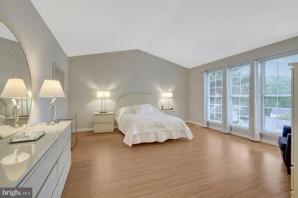 a view of balcony with wooden floor