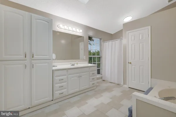 a bathroom with a toilet and a sink