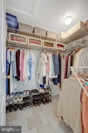 a front view of a house with a yard and a garage