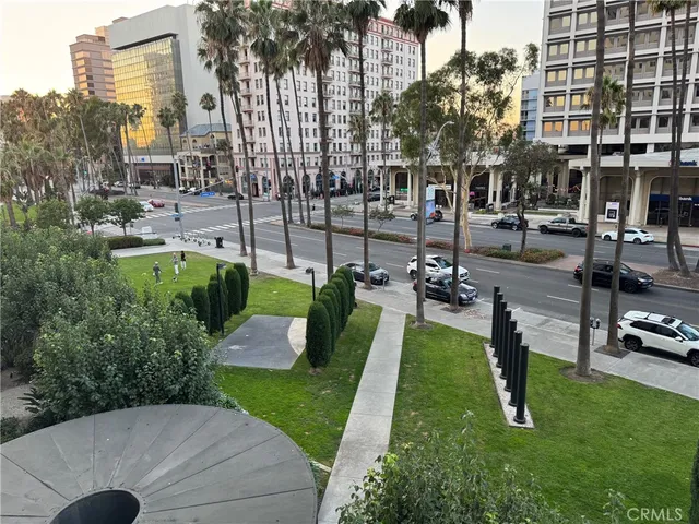 a view of a backyard with sitting area