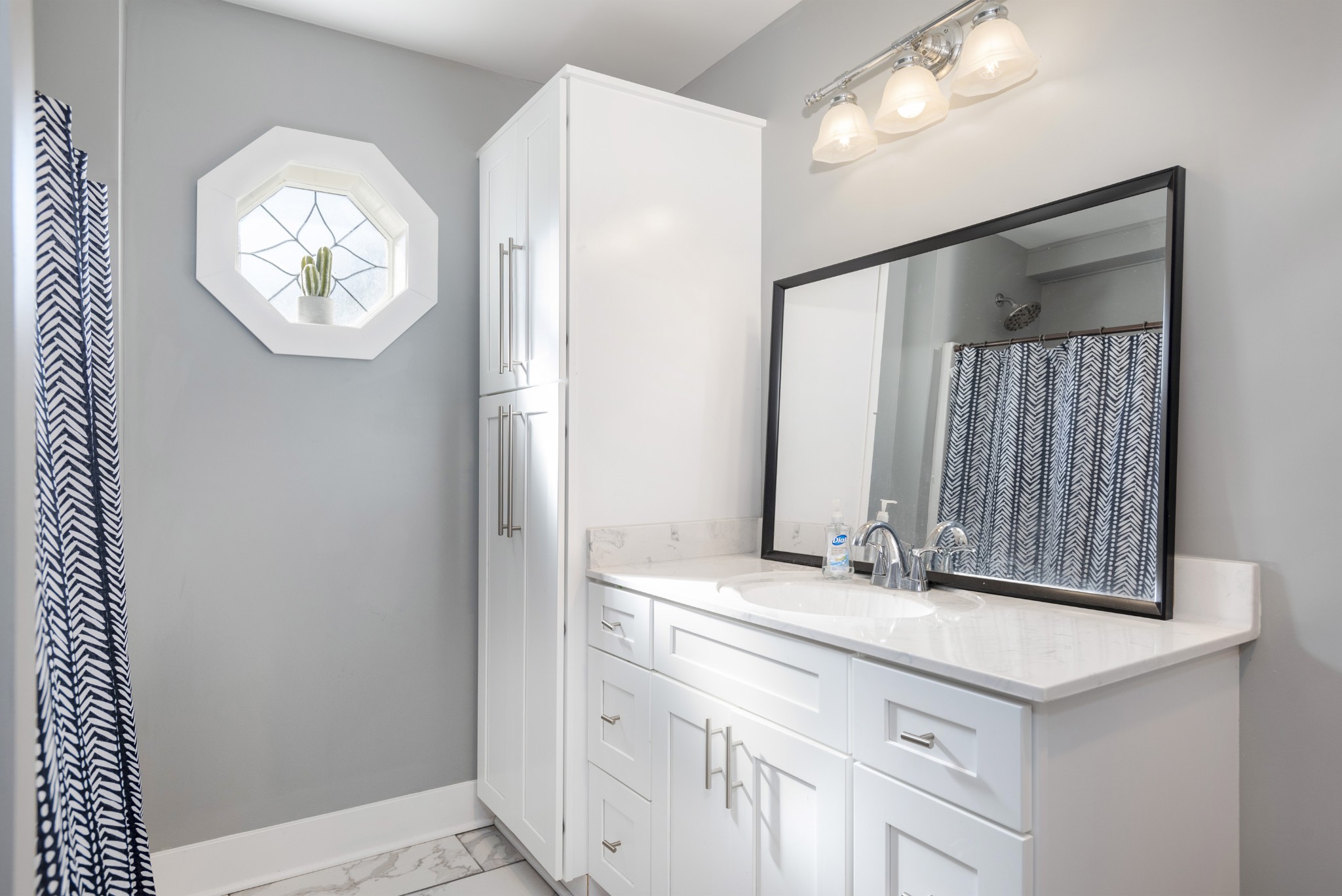 108 Esque Road Bethpage, TN 37022 - Photo 18 of 30 a bathroom with a sink and a mirror