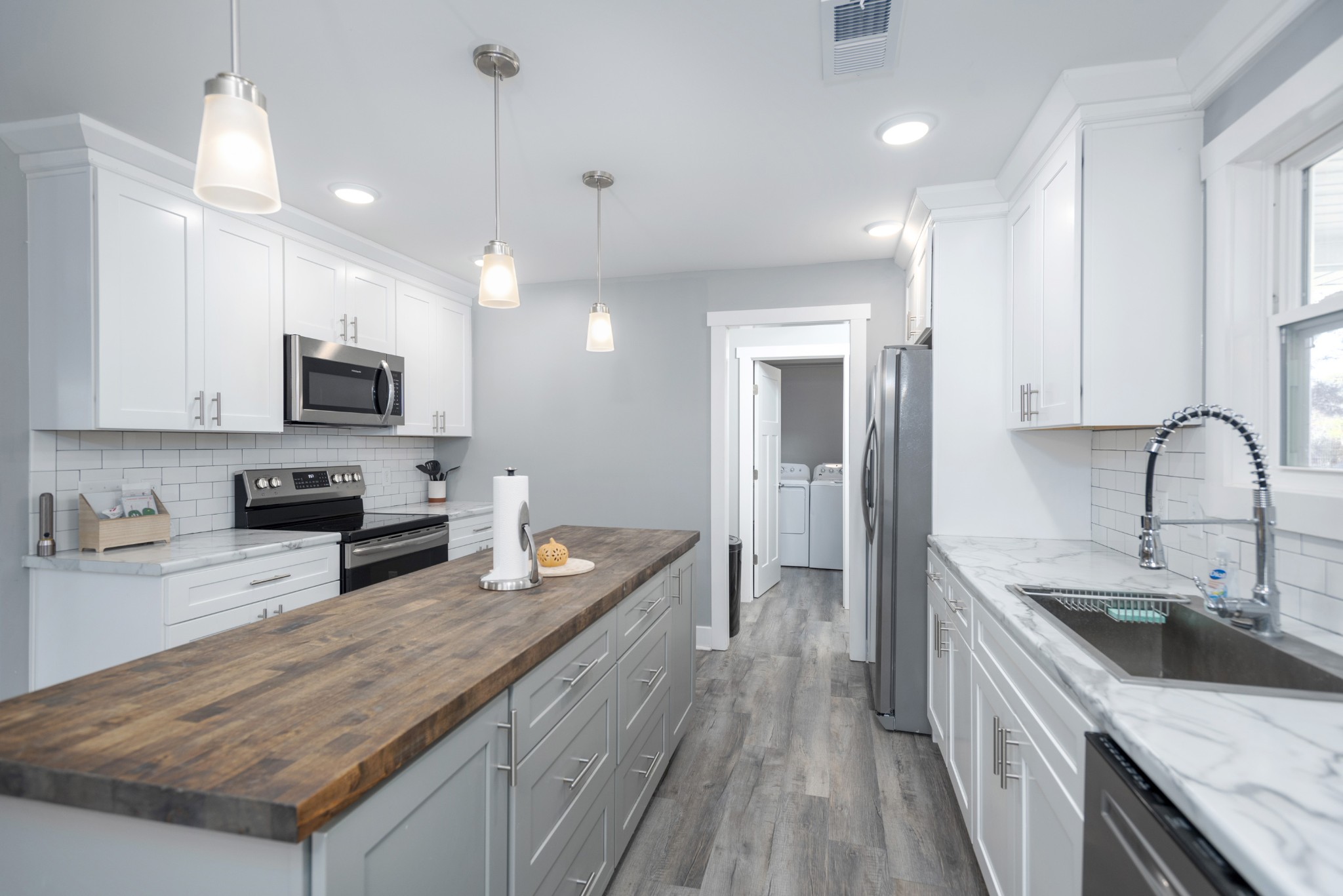 108 Esque Road Bethpage, TN 37022 - Photo 4 of 30 a kitchen with stainless steel appliances granite countertop a sink stove and refrigerator