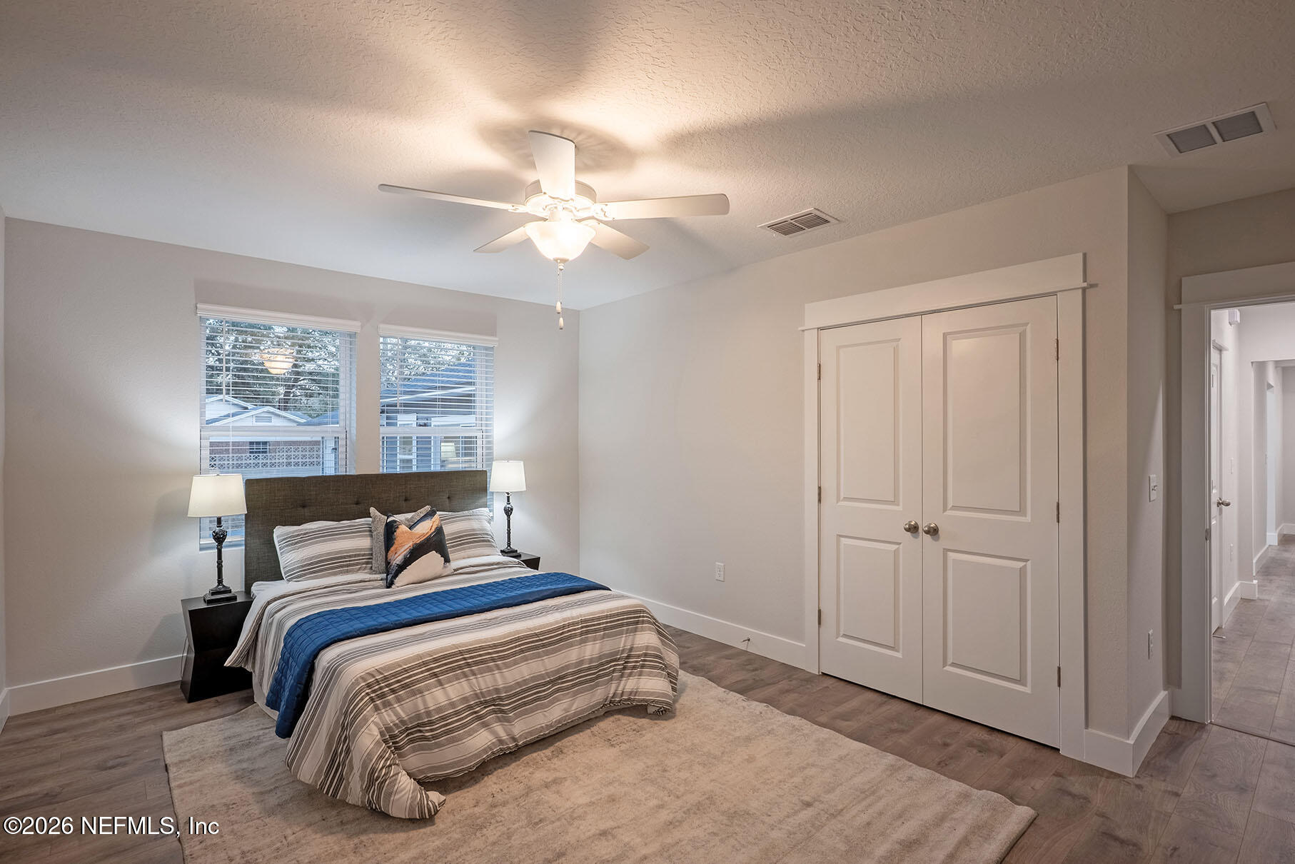 2743 Chelton Road Jacksonville, FL 32216 - Photo 16 of 51 a bedroom with a bed and a window