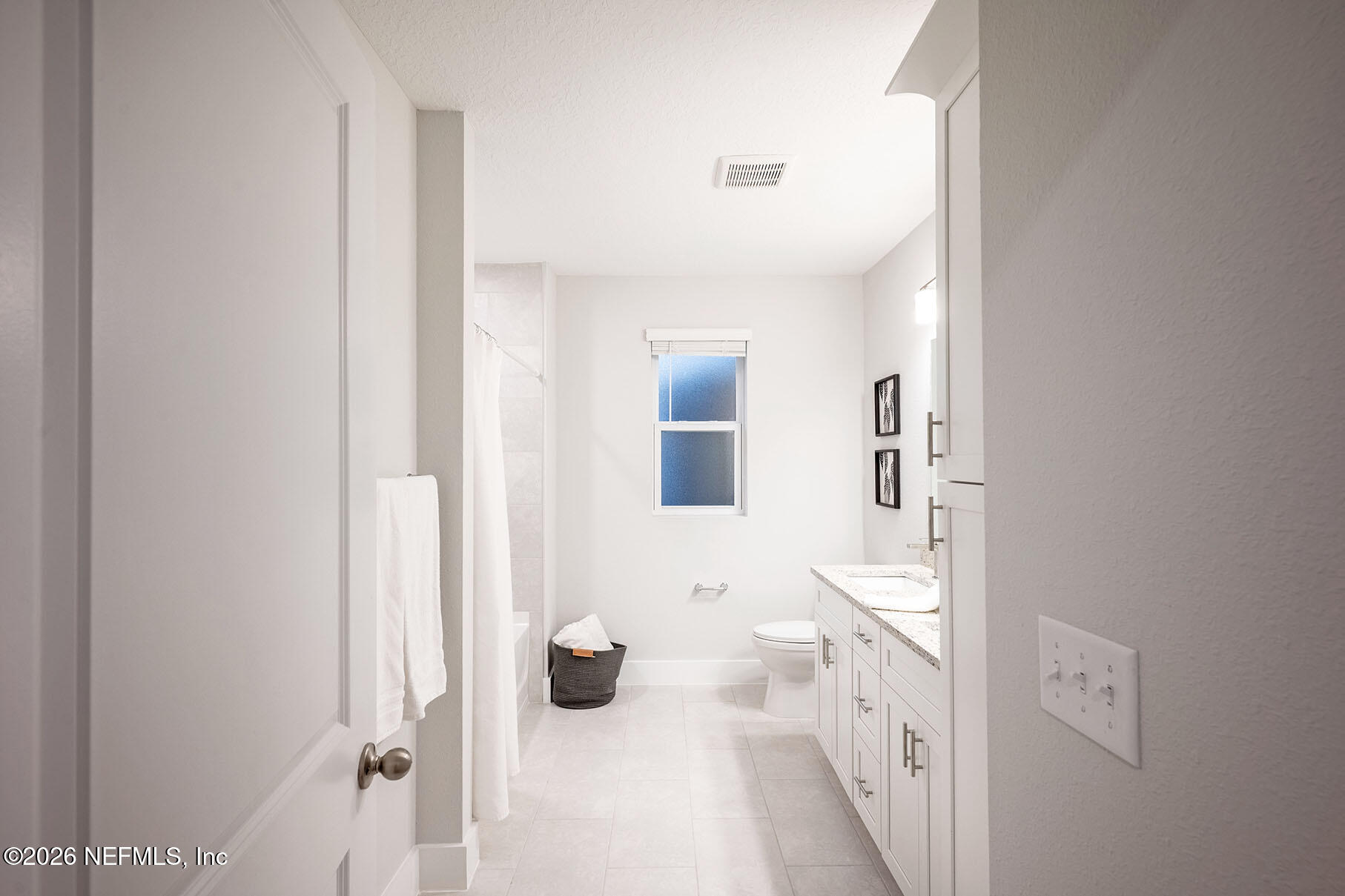 2743 Chelton Road Jacksonville, FL 32216 - Photo 19 of 51 a bathroom with a sink and a mirror