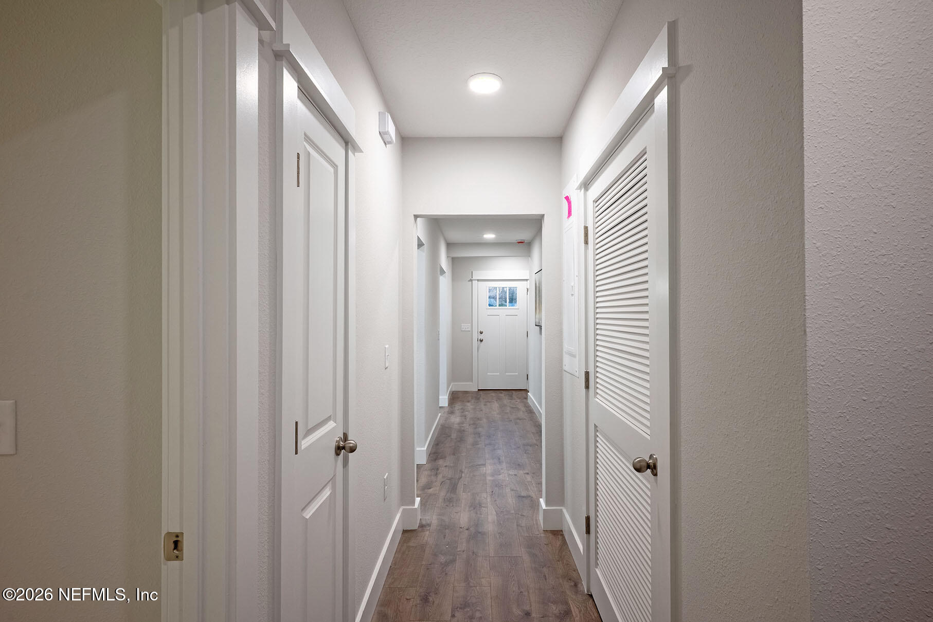 2743 Chelton Road Jacksonville, FL 32216 - Photo 23 of 51 a view of a hallway with wooden floor