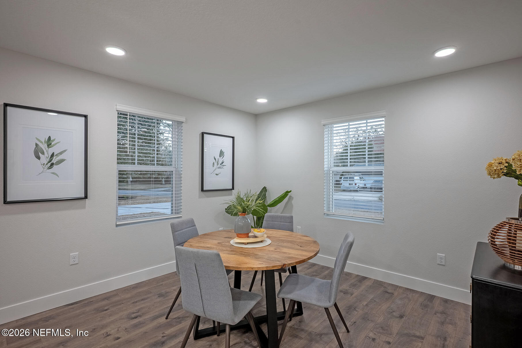 2743 Chelton Road Jacksonville, FL 32216 - Photo 26 of 51 a view of a dining room with furniture window and wooden floor