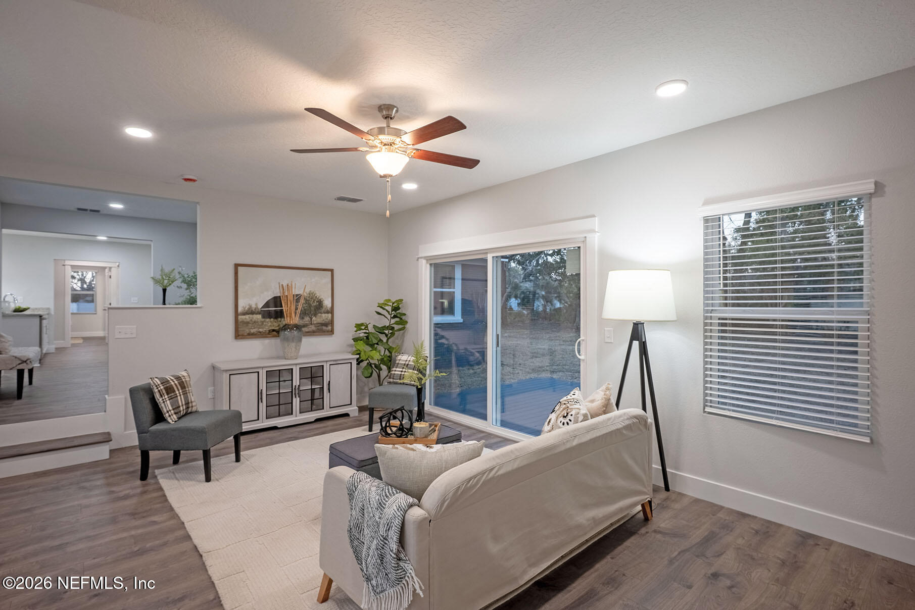 2743 Chelton Road Jacksonville, FL 32216 - Photo 40 of 51 a living room with furniture and a large window