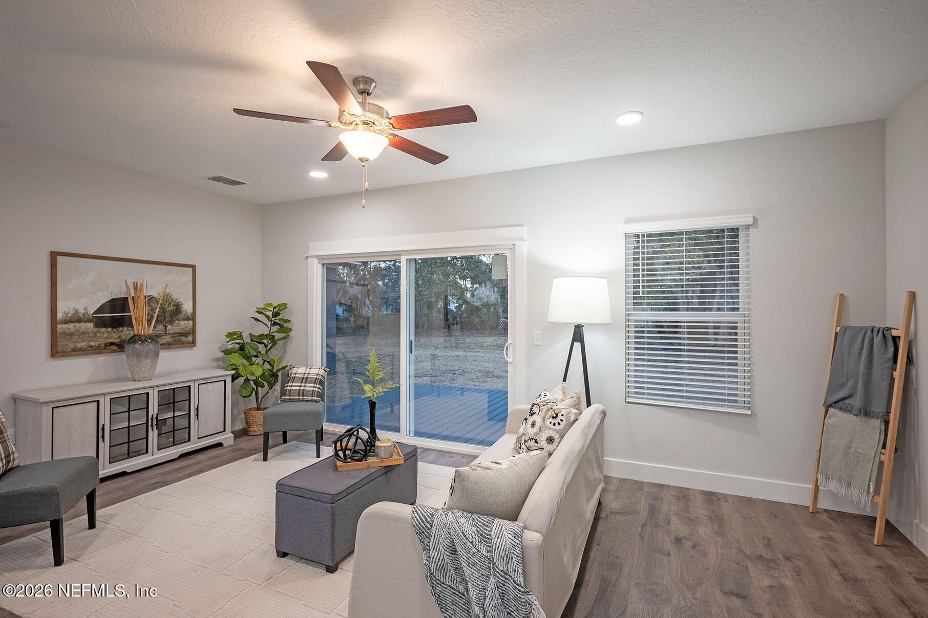 2743 Chelton Road Jacksonville, FL 32216 - Photo 41 of 51 a living room with furniture and a window