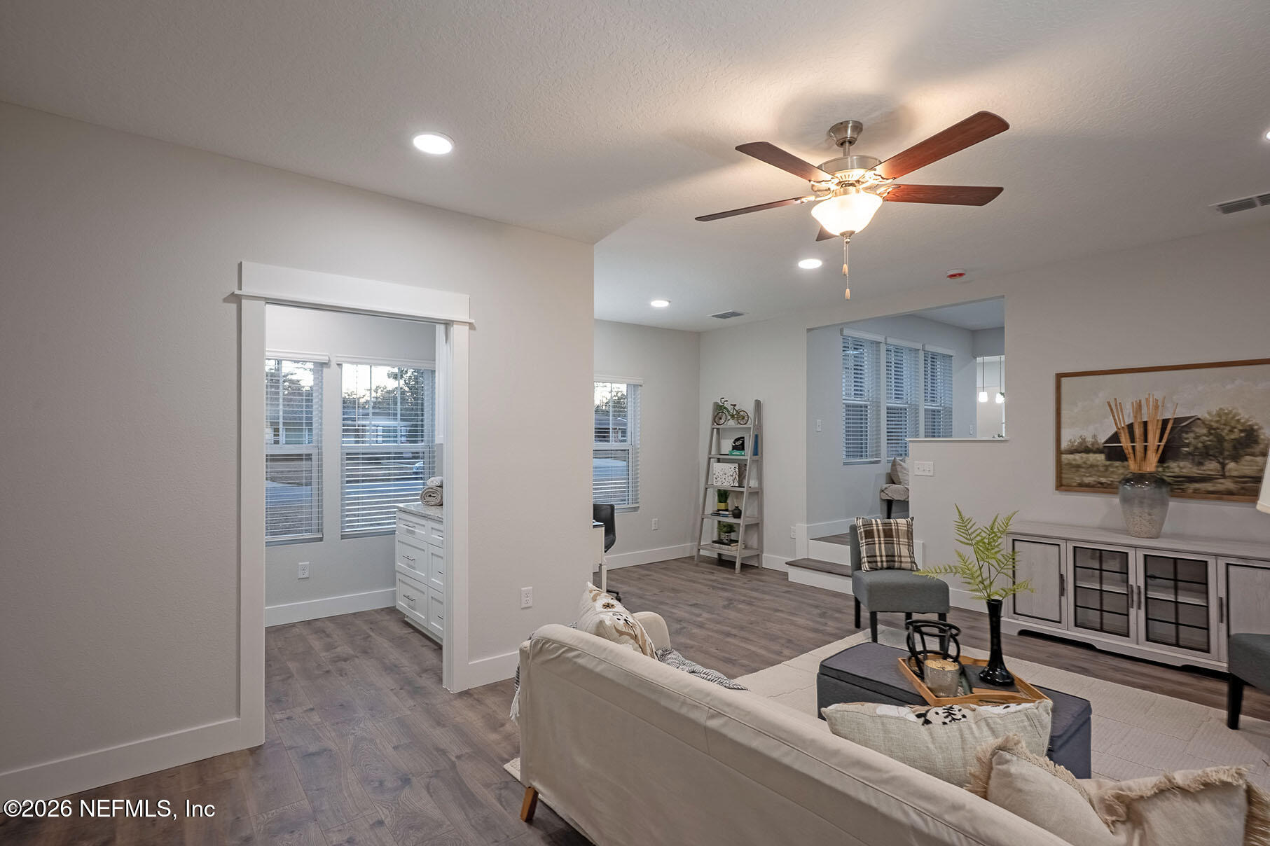 2743 Chelton Road Jacksonville, FL 32216 - Photo 42 of 51 a living room with furniture and wooden floor