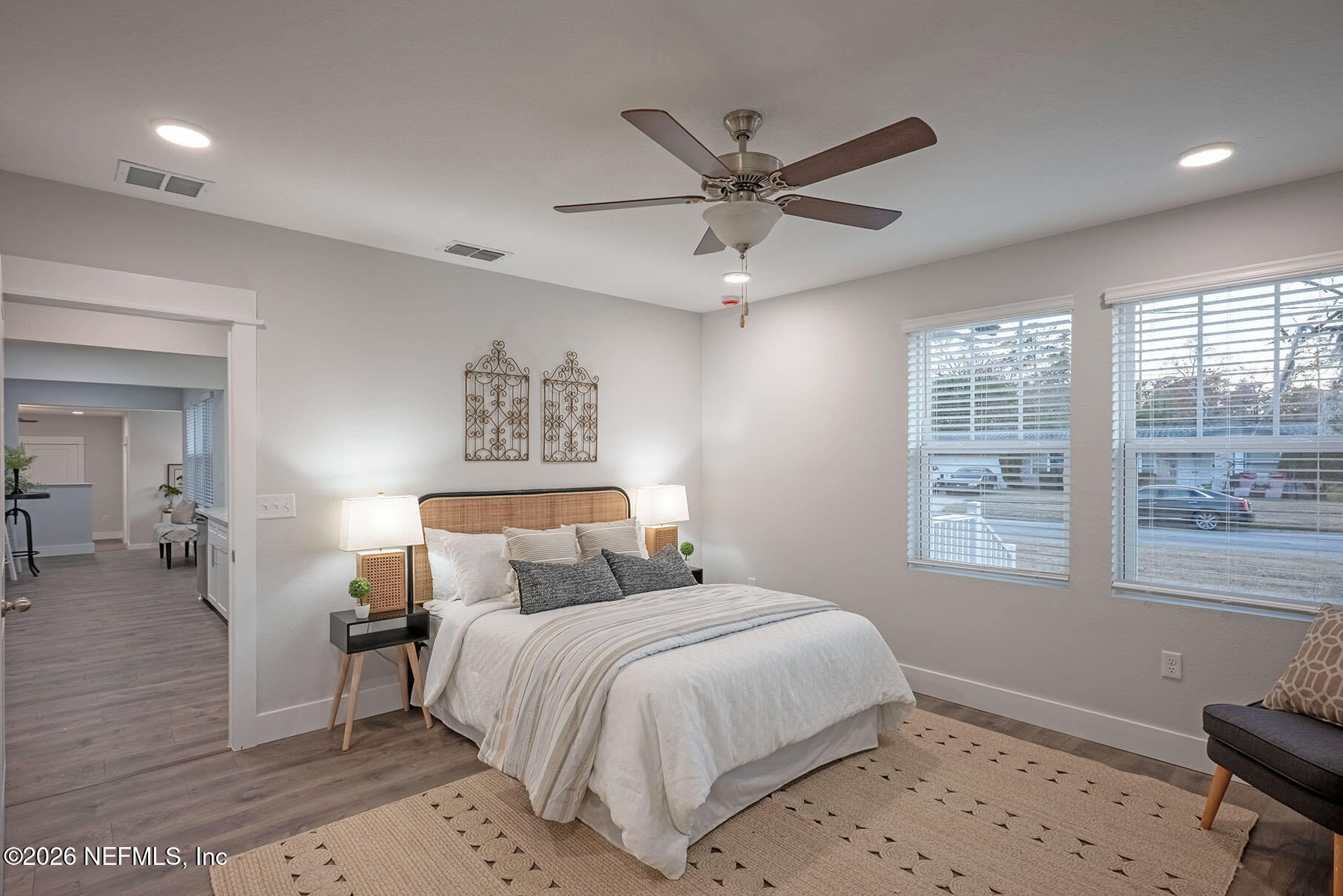 2743 Chelton Road Jacksonville, FL 32216 - Photo 5 of 51 a bedroom with a large bed and a window