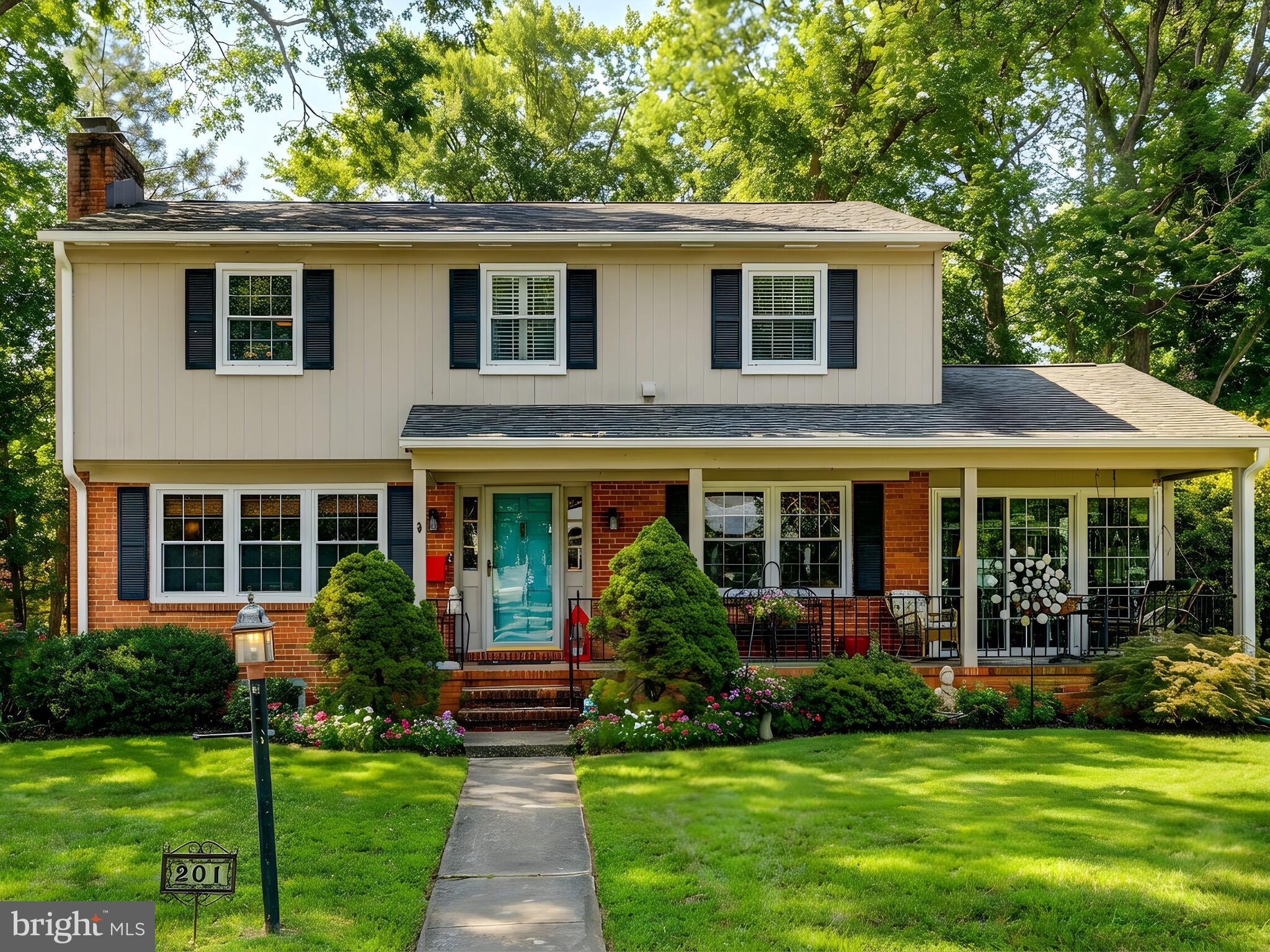 201 Brightdale Road Lutherville-Timonium, MD 21093 - Photo 1 of 48 a view of a house with a yard and potted plants