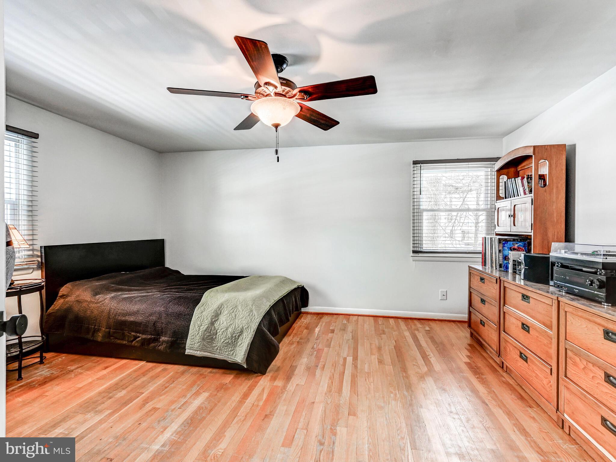 201 Brightdale Road Lutherville-Timonium, MD 21093 - Photo 27 of 48 a bedroom with double bed and a flat tv screen