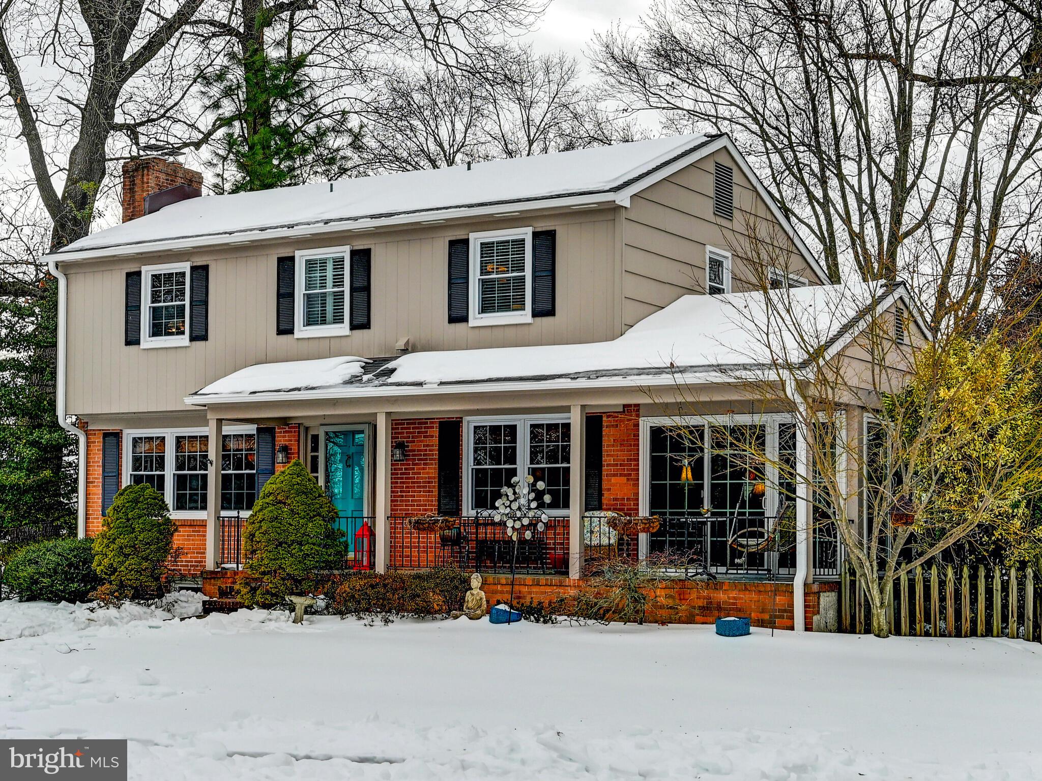201 Brightdale Road Lutherville-Timonium, MD 21093 - Photo 3 of 48 a view of a white house with large windows and a large tree