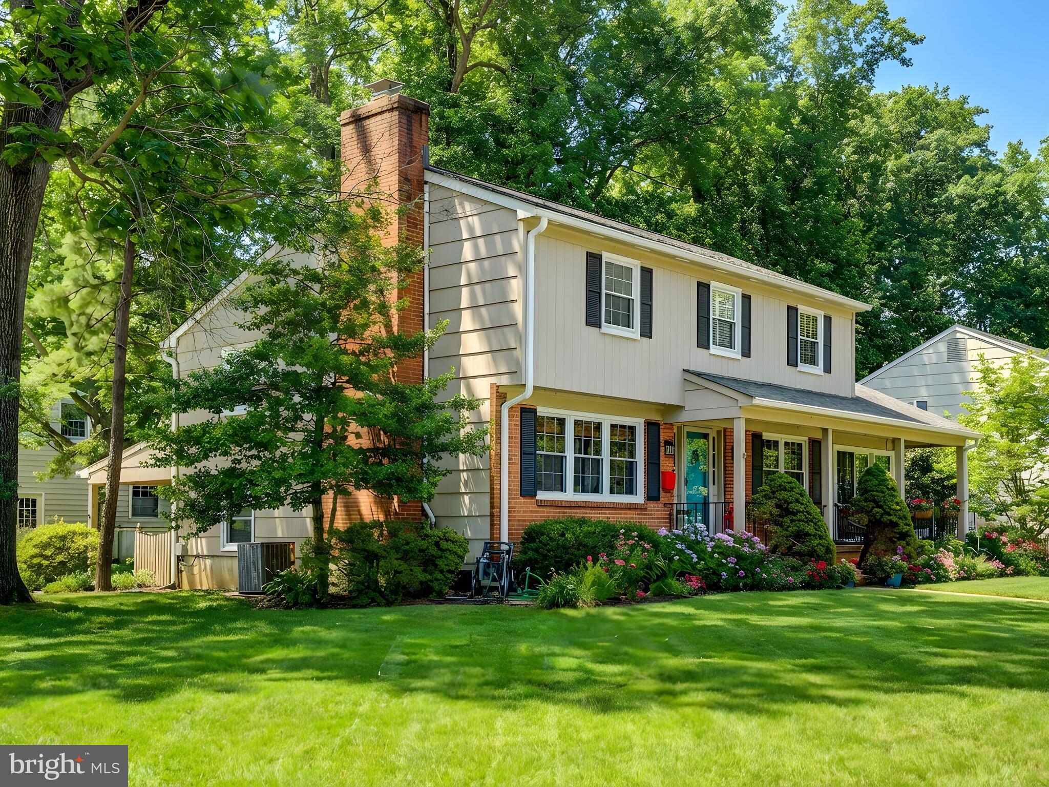 201 Brightdale Road Lutherville-Timonium, MD 21093 - Photo 45 of 48 a front view of a house with a garden