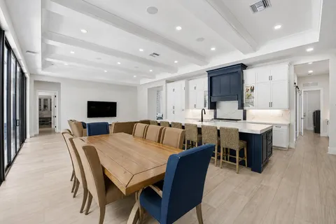 a kitchen with stainless steel appliances sink microwave refrigerator and stove