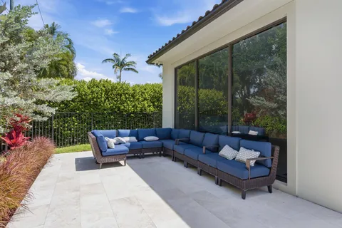 a outdoor living space with furniture and a potted plant