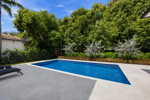 a view of outdoor space and swimming pool