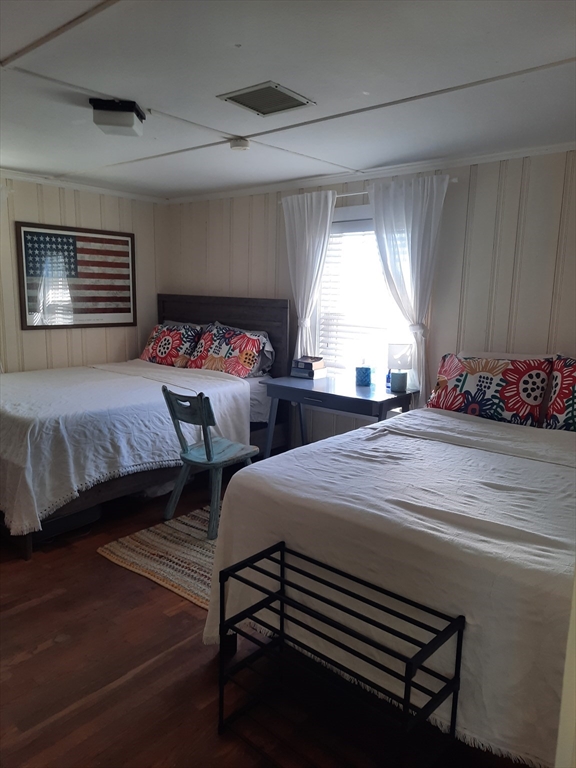 77 Gurnet Road, Unit 77 Duxbury, MA 02332 - Photo 13 of 15 a bedroom with two beds and a window